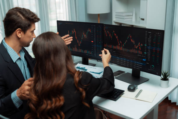 istock Business traders discussing on dynamic stock risk or profit point. Postulate. 2154529639