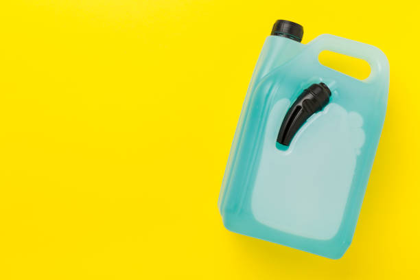 istock Can with antifreeze on color background, top view 2154531920