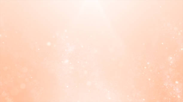 Peach background with bright glowing lights or shimmering particles all over, soft blur effect.