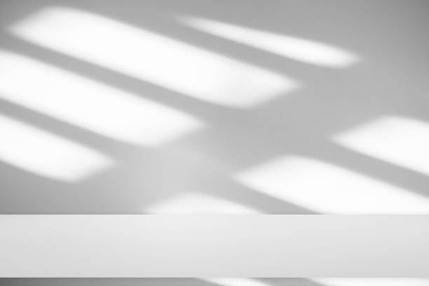 istock Wall interior background, studio and backdrops show products.with shadow from window color white . background for text insertion and presentation product 2154537880