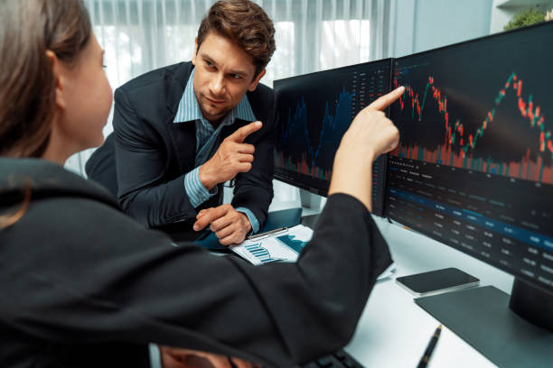 istock Business traders discussing on dynamic stock risk or profit point. Postulate. 2154540950