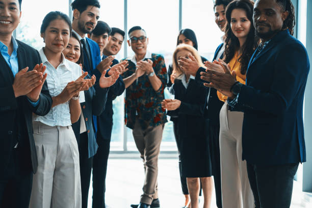 istock Diverse business people clapping and applause at new manager. Intellectual. 2154543081