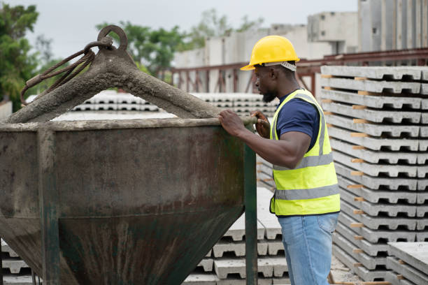 istock Portrait African worker man working with cement precast and concrete mix at precast cement outdoor factor 2154547259