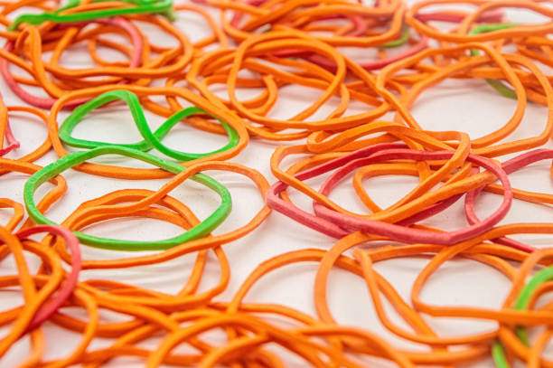 istock a bunch of messy rubber bands on a white background 2154548905