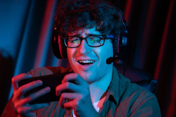 istock Stressful streamer team playing with Esport on phone with harder game. Gusher. 2154549199