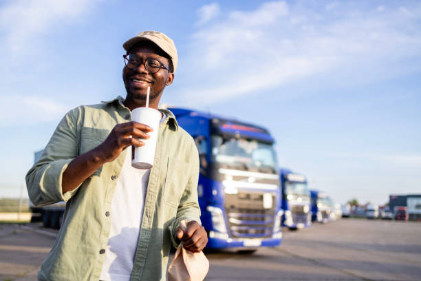 istock Happy driver at truck stop going to work. 2154551761