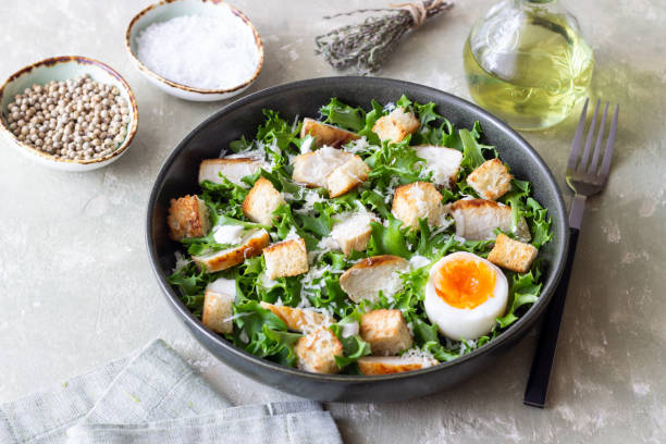 istock Caesar salad with chicken. Healthy eating. Diet. 2154554686