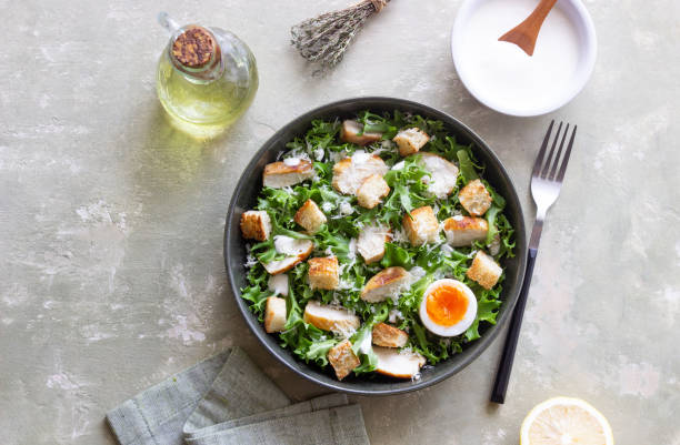 istock Caesar salad with chicken. Healthy eating. Diet. 2154554716