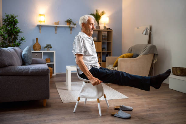 istock Senior man exercising at home 2154555041