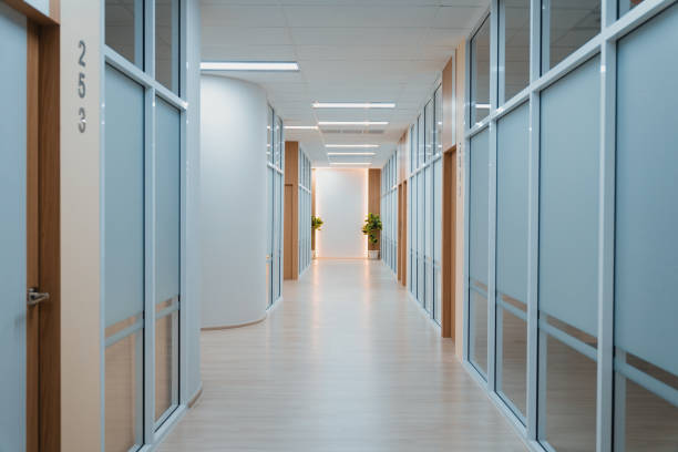 istock Empty modern office bright corridor with glass wall. Hall way. Ornamented. 2154555233