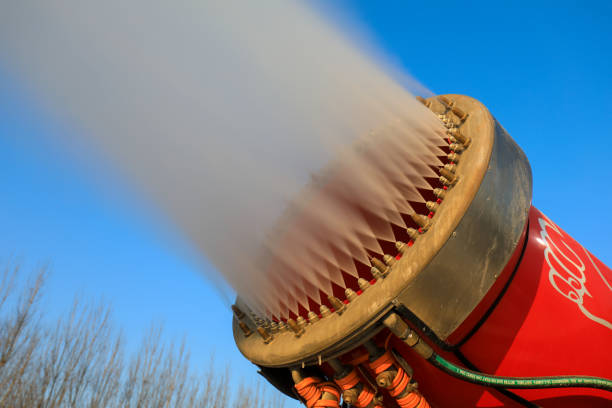 Snow making machinery in operation in a ski resort, North China