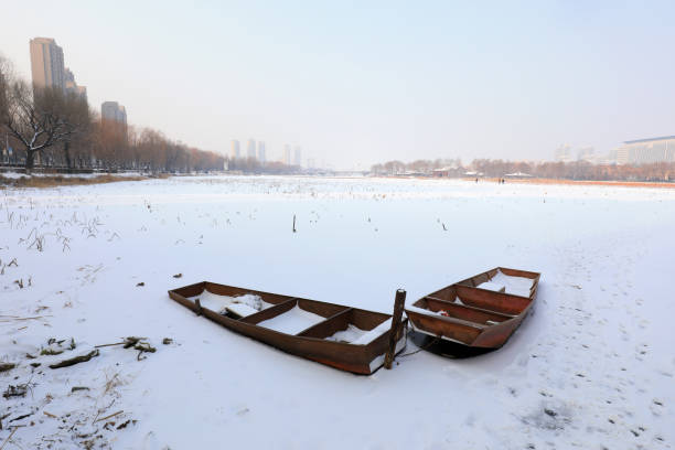 Wooden boat in snow, North China