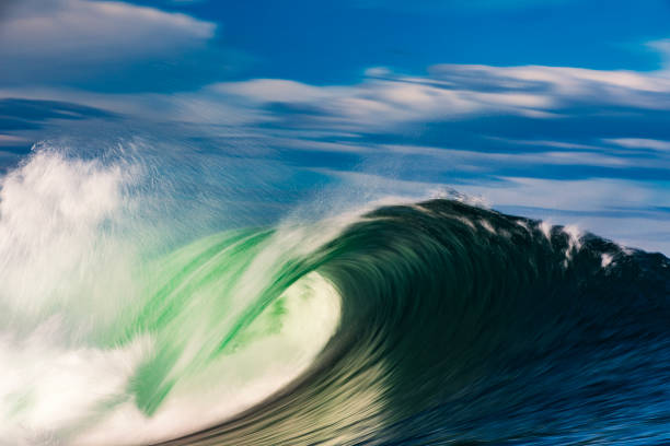 istock Abstract offshore wave breaking in warm afternoon light captured with blurred motion 2154556696