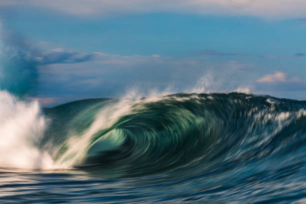 istock Abstract offshore wave breaking in warm afternoon light captured with blurred motion 2154556738