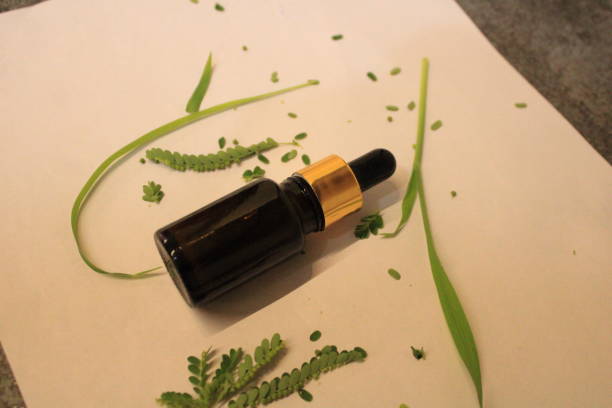 A photography for ayurvedic concept. Glass dropper bottle.
