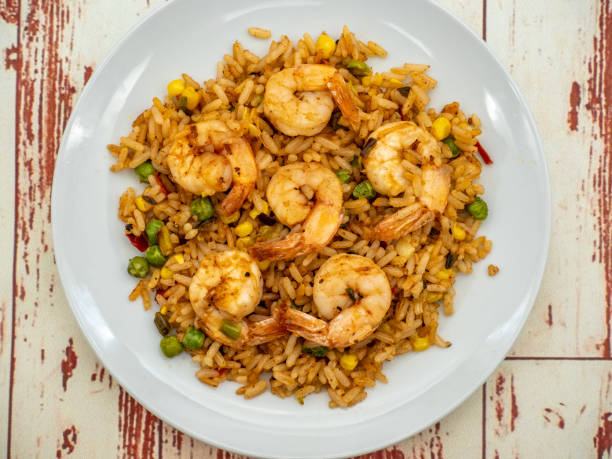 istock shrimp, stir fried rice and shrimps on plate 2154558468