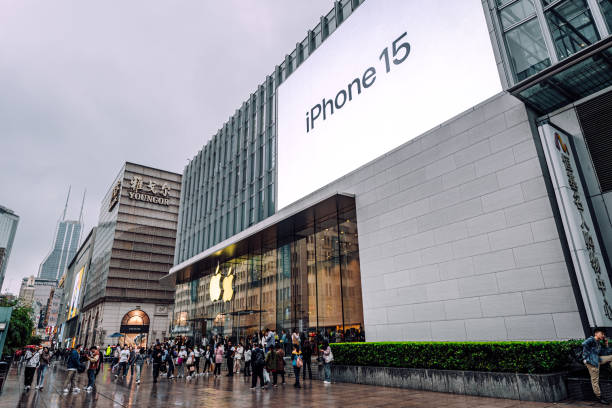 People gathering outside the Apple Store in Shanghai, China, on October 13, 2023,