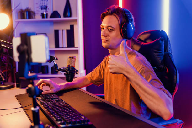istock Streamer live steaming on media social online by smartphone. Pecuniary. 2154560427