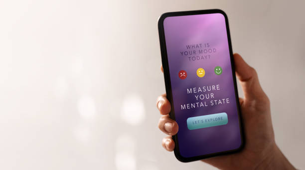 istock Mental Health Concept. Using  Mobile Application to Check, Measure and Practicing Mind. Self Care and Soothing Life. App show on Mobile Phone. 2154561999