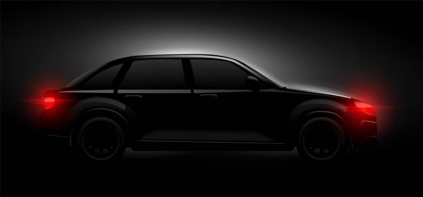 istock Realistic car silhouette. Black sleek supercar side view, luxury cars with glow headlight in dark night background, abstract hide auto driving concept nowaday vector 2154570204