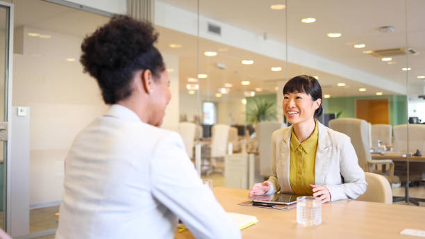 istock Two businesswomen cooperating 2154578077