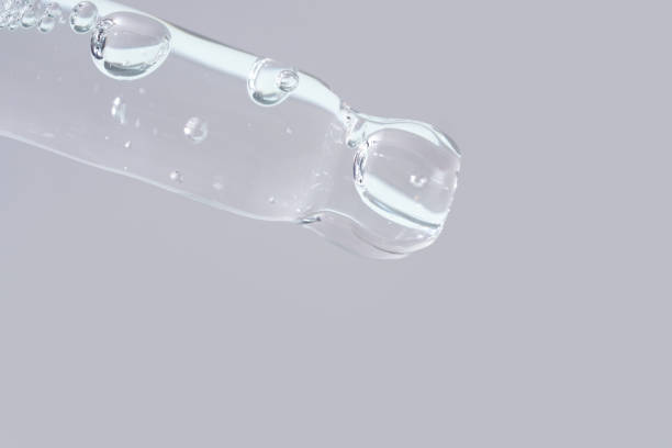 istock A glass pipette containing a cosmetic product. 2154580444