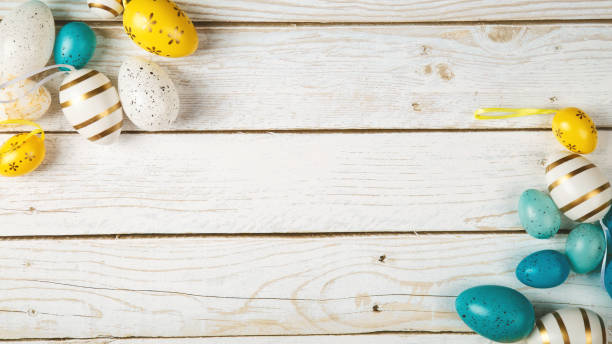 istock happy easter. holidays background with easter eggs decoration on wooden background 2154580490