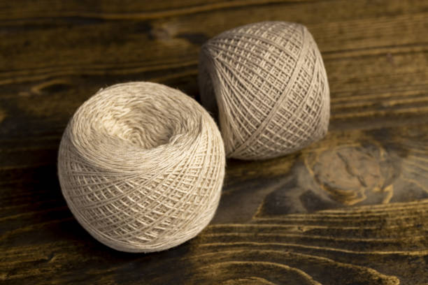 istock close-up of a ball of light-colored thread for needlework 2154581918