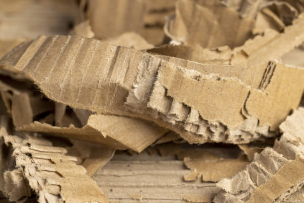 old crumpled and damaged waste paper cardboard