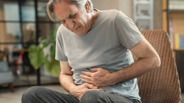 istock Senior man with stomach pain 2154584003