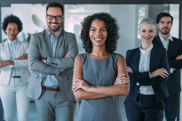 istock Confident businesswoman and her team. 2154584834