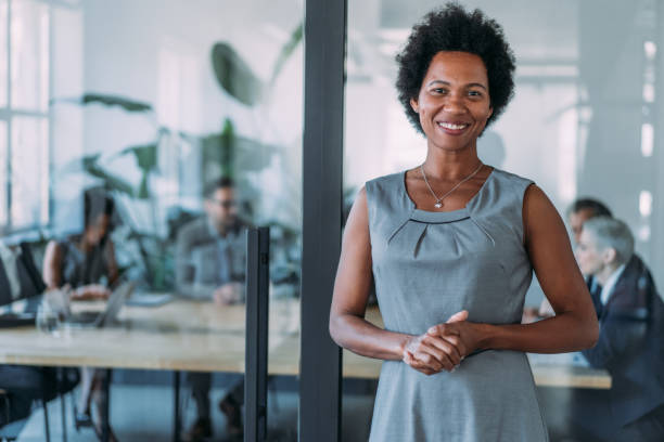istock Confident businesswoman and her team. 2154584845