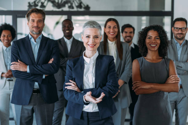 istock Confident businesswoman and her team. 2154584846