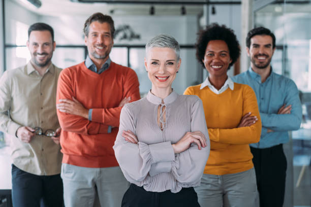 istock Confident businesswoman and her team. 2154584865