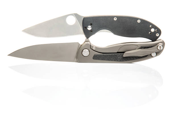 istock two folding knives on a white background. item for tourism and survival. 2154586527