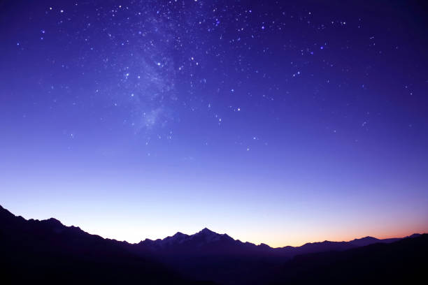 istock the starry sky in the mountains before the morning dawn. astronomy and planetary observation 2154586607