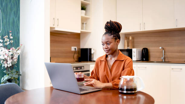 istock Happy woman talking to someone online 2154605085