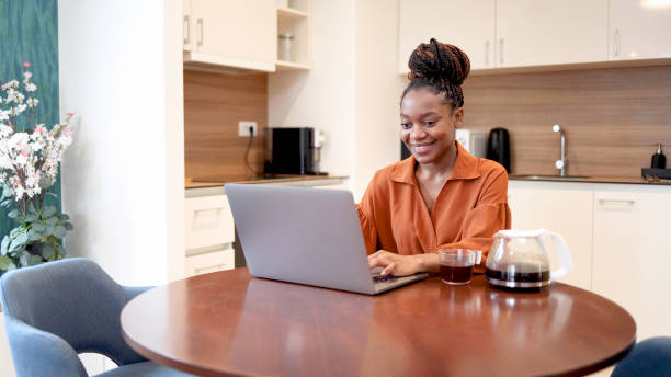 istock Happy woman talking to someone online 2154605091