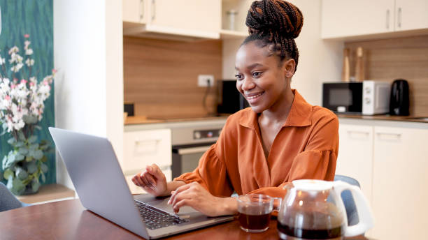 istock Happy woman talking to someone online 2154605112
