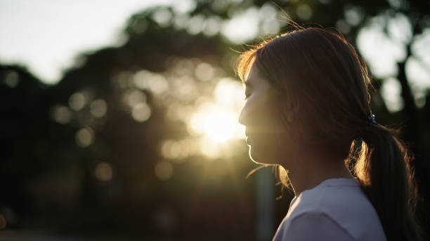 istock Young woman relaxing in nature. 2154608737