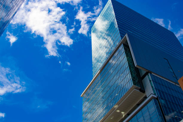 A cloud reflecting a building in the business town. High quality photo. Shibuya district Shibuya Tokyo Japan 05.16.2024 Here is a center of the city in Tokyo.