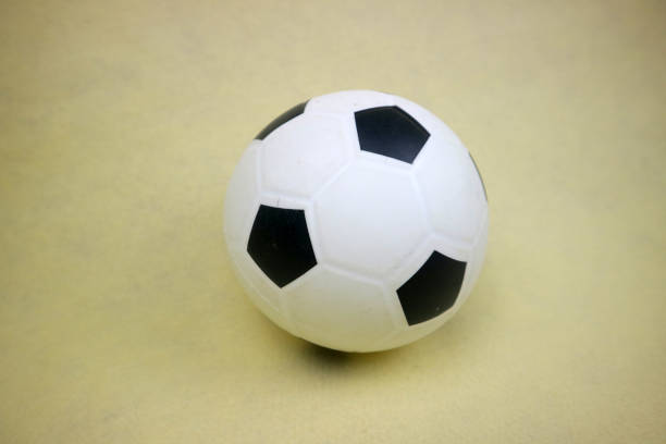 istock a small white and black toy rubber ball 2154609819