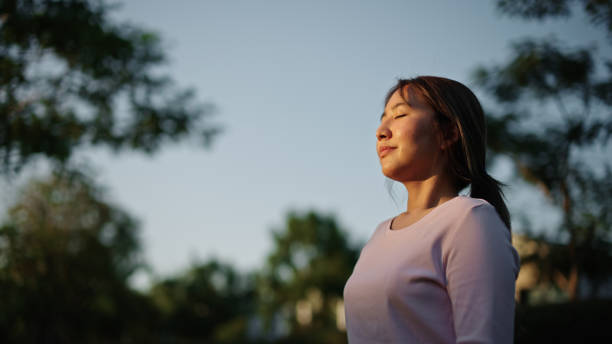 istock Woman relaxing in nature. 2154611136