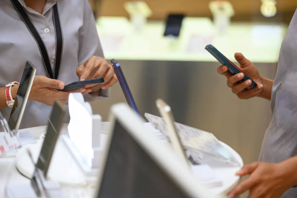 istock saleswoman assisting the customer 2154614894