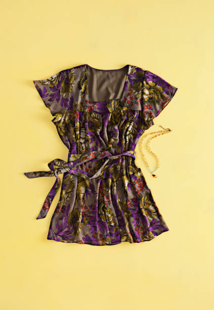 Fashionable blouse on yellow background