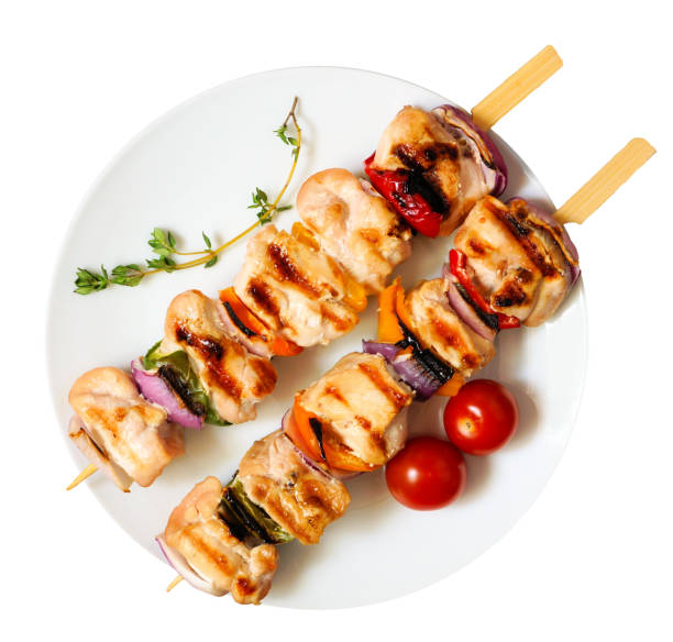 istock Grilled chicken and vegetable skewers isolated on white 2154617909