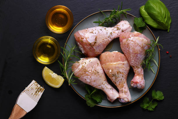 istock Hot Air Fryer preparing and marinating Chicken Drumsticks 2154621118