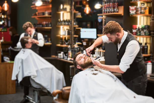 istock Busy day in modern barbershop. 2154621778