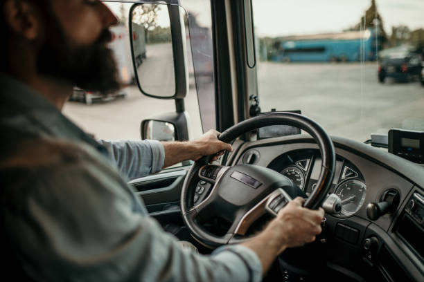istock Professional truck driver on the road 2154626474