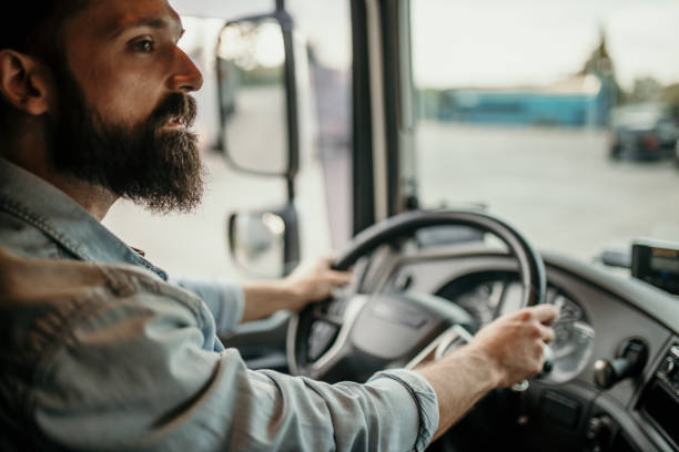 istock Professional truck driver on the road 2154626475